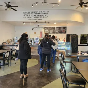 a group of people in a restaurant