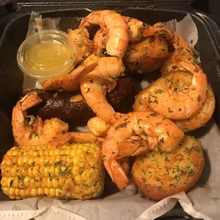 Shrimp Box with red potatoes, corn, sausage and garlic butter.