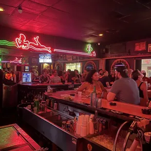 people sitting at the bar