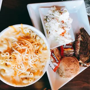 Brisket style Reuben sandwich (slow roasted pulled corned beef) with coleslaw and mac n cheese sides.