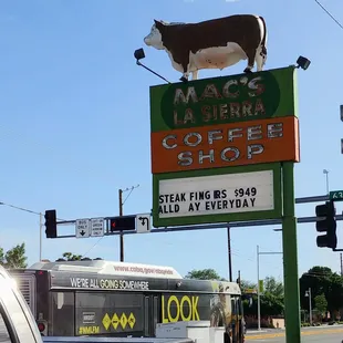 a cow on the sign