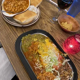 Sopapillas stuffed with carne adovado covered with red and green chili and rice and beans. Pozole with sopapillas.