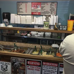 Inside, menu and pro gun signs