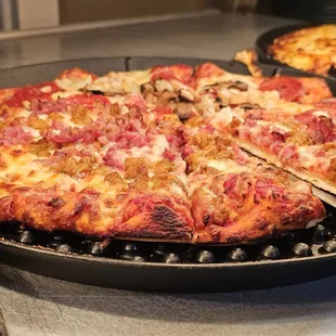 a whole pizza on a pan