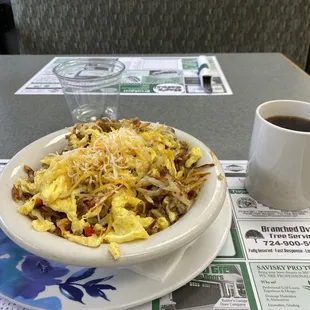 Breakfast bowl with a Coffe and lemon water