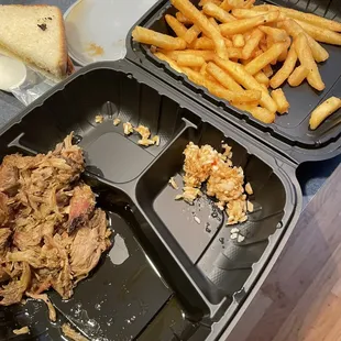 Got order to go. Actual picture of plates after opening. Guess there was a shortage of slaw.