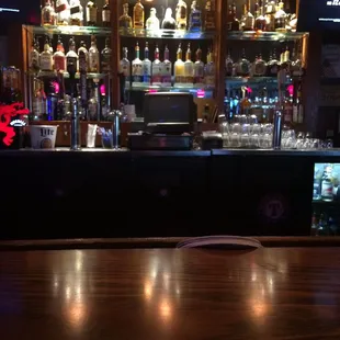 a bar with liquor bottles