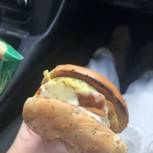 Everything bagel with bacon, egg, cheese, and cream cheese