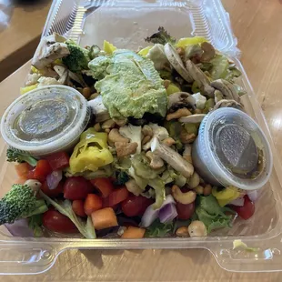a salad in a plastic container