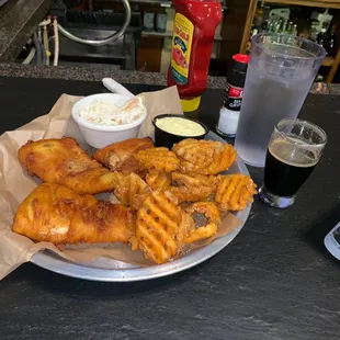 Fish and chips with cod. Sampler size Irish stout.
