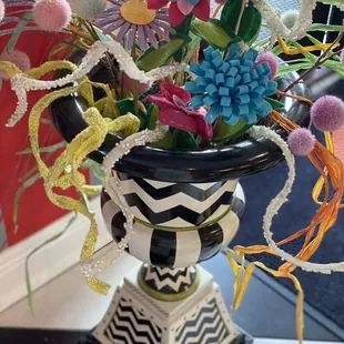 a vase of flowers on a table