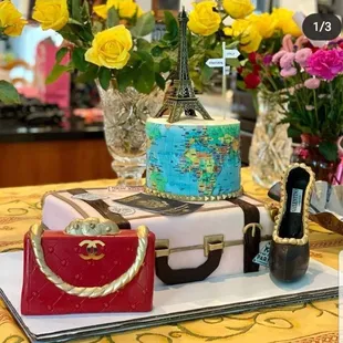 Travel themed cake with designer accessories!