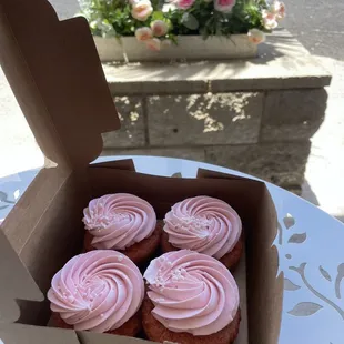 a box of cupcakes on a table