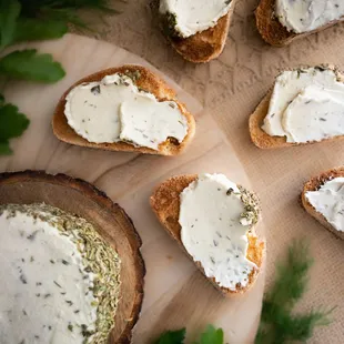 a spread of cream cheese on toasted bread