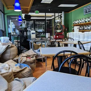 tables and chairs in a coffee shop