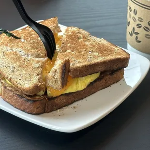 Egg and cheese on wheat toast: thick slice of egg, satisfying!