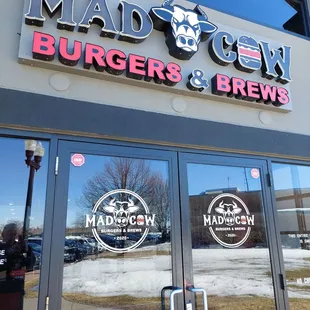 the entrance to mad cow burgers and brews