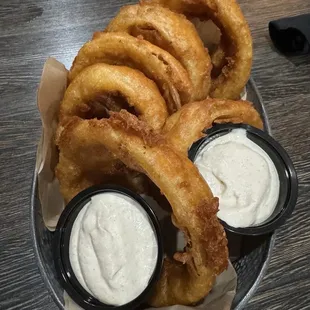 Onion rings with two sides of creamy horseradish sauce