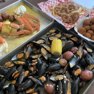 Snow crab, mussels, calamari, and hush puppies