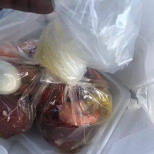 Crawfish and shrimp with corn potatoes eggs medium spice and garlic butter sauce