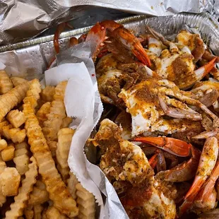 crab legs, fries, and cheese
