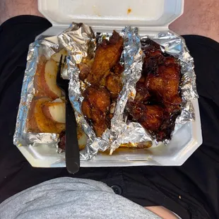 Medium garlic wings and teriyaki wings with seasoned potatoes
