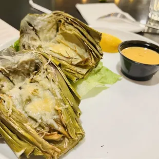Grilled Artichoke with garlic Parmesan and a Cajun remoulade