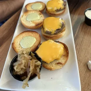 Sliders with onions on the side