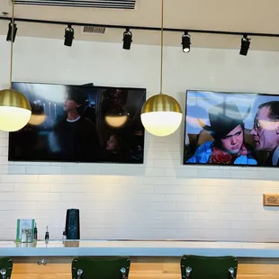 Entrance Tv screens with Hocus Pocus and William wonka ... classics