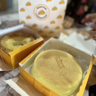 two boxes of cheesecakes