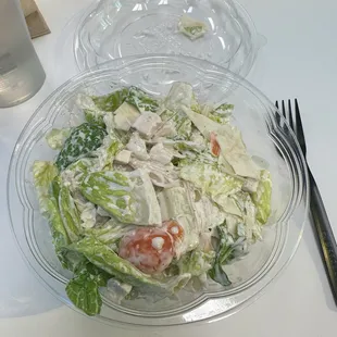 Small mad Cesar with no croutons and extra cheese