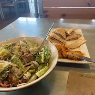 Ceasar salad and a plate of hummus. Made fresh right in front of me. Great stuff!