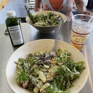 Two salads, pressed juice and cream soda