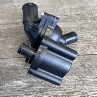 thermostat housing unit