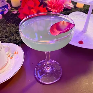 a cocktail in a glass on a table