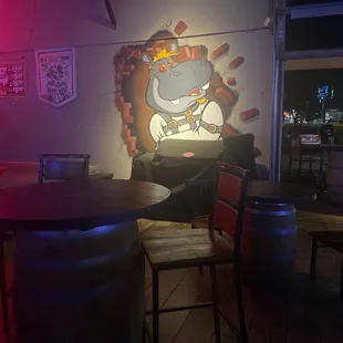 a hippo sitting in a chair