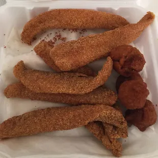 Tilapia and fried mushrooms. My go-to meal here