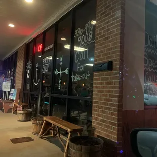 Exit door as seen from the take-out line  at night