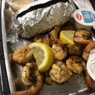 Grilled Shrimp with baked potato (left off the slaw) - $15.95