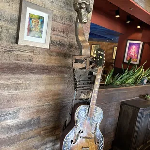 a guitar in a restaurant