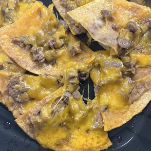 Steak fajita nachos excellent we'll do it again. Everything served on the side for it to go great work great flavor. I'll be back.