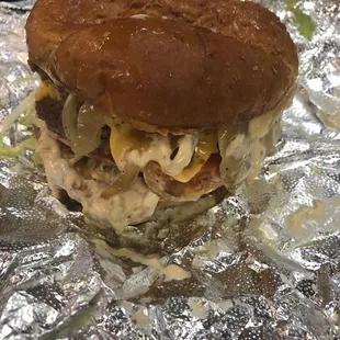 American outlaw!!! 2 beef patties, cheese, lettuce, tomato,mad mikes sauce, pickles, and sautéed onions!! This is my fave