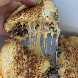 &quot;Hot &apos;n Heavy&quot; - french onion roast beef, horseradish cream sauce, cheddar, Monterey jack and I added in green onions.