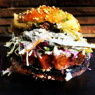 The People Eater- Smoked potato, red chili butternut squash, salsa verde, chihuaha