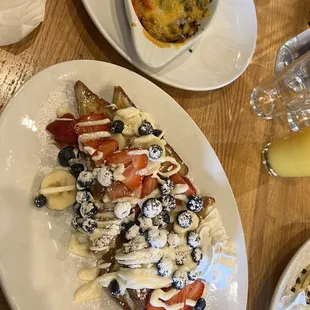 Full stuffed French toast and a side of Mad Baby Reds