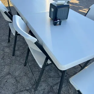 Seating area under pop up tent.