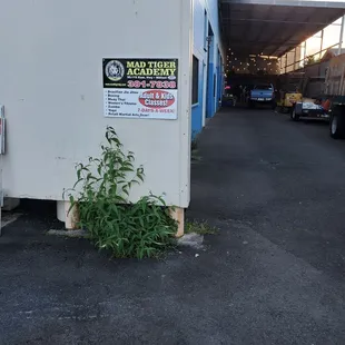 Long, walkway on the right side to get to the gym