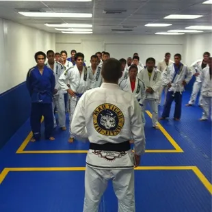 Coach Eric giving the class an inspirational speech.