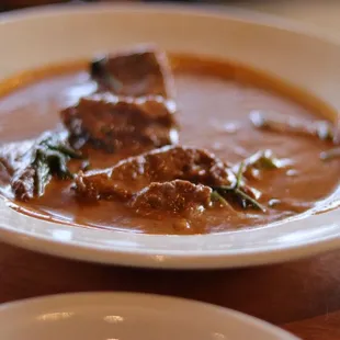  a closeup of a bowl of soup