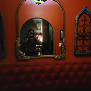 Taking a shot of the red enclosed booth area.